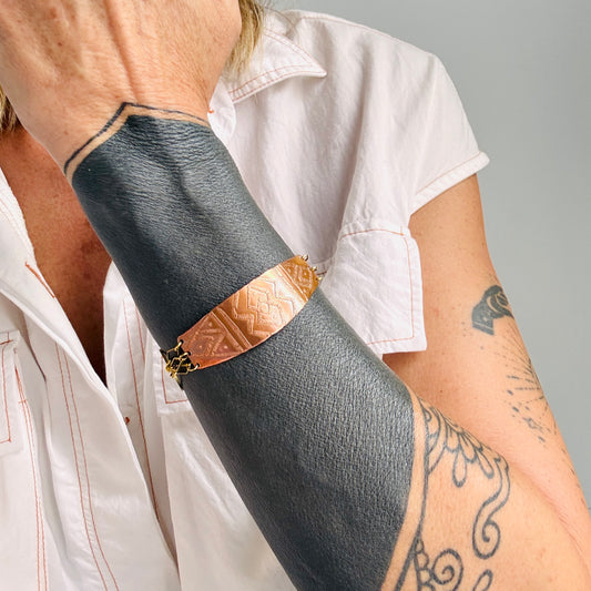 ETCHED COPPER BRACELET WITH BRASS LINK DETAIL