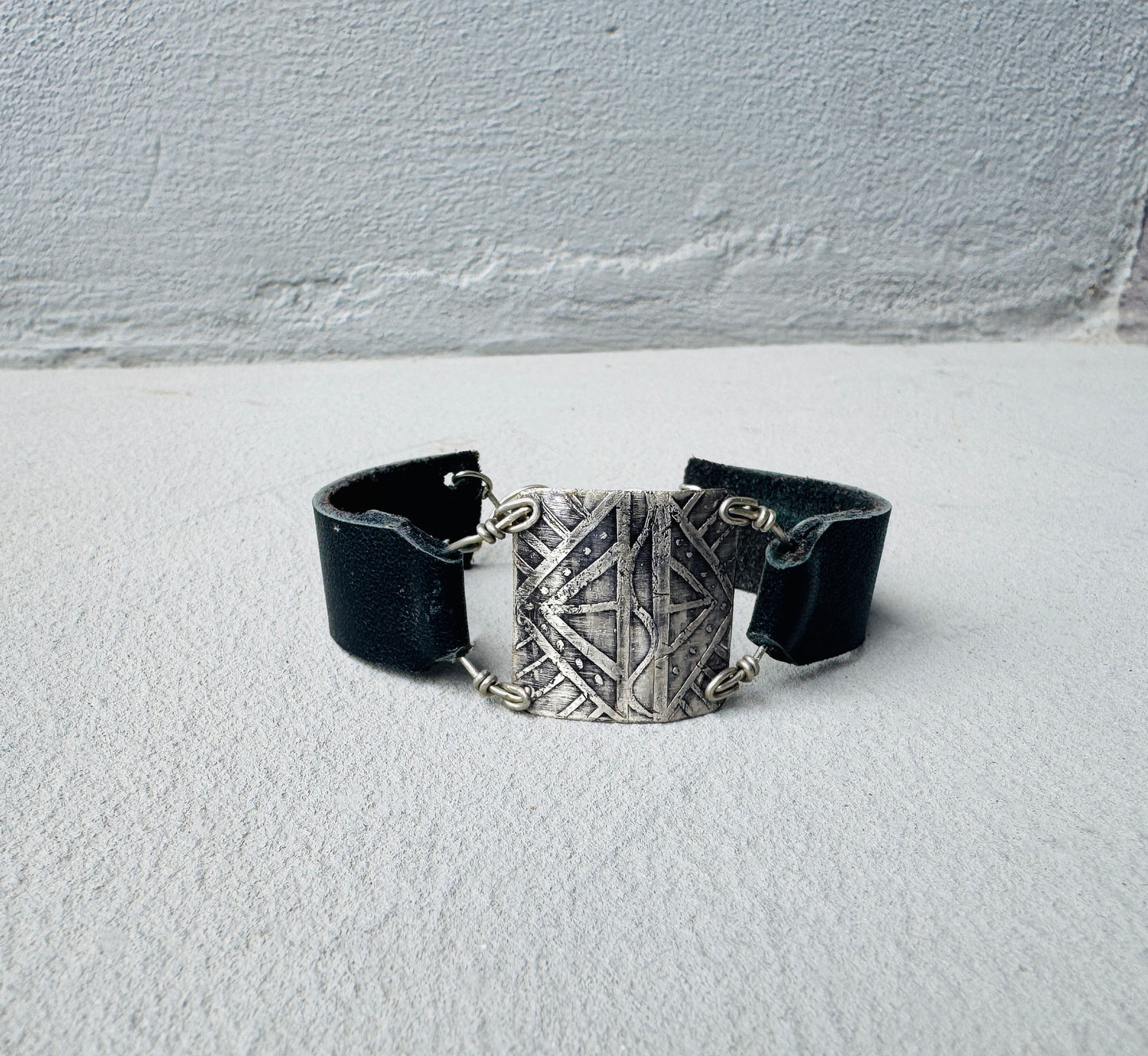 TRIBAL ETCHED SILVER AND BLACK LEATHER BRACELET - end of season sale