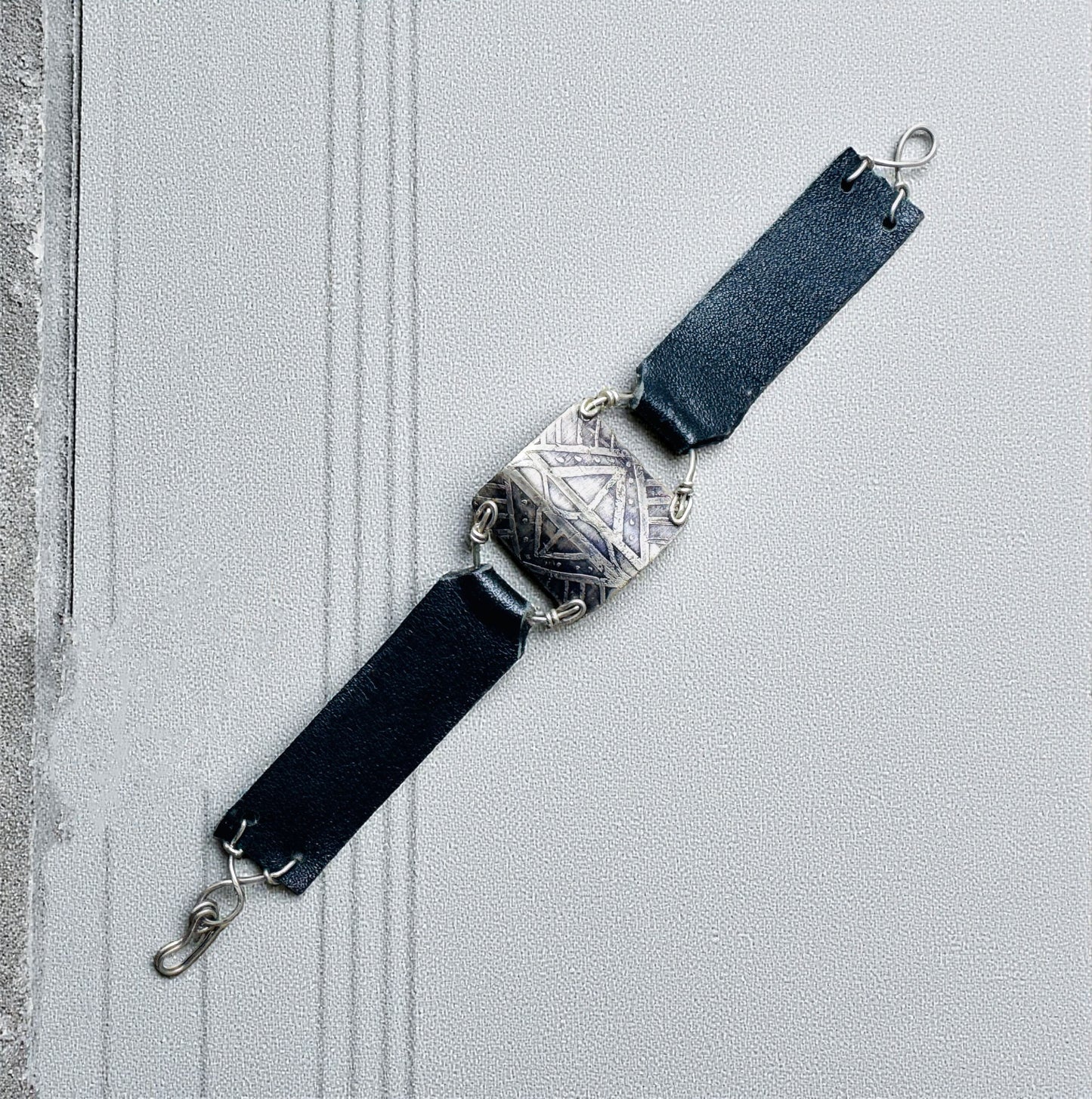 TRIBAL ETCHED SILVER AND BLACK LEATHER BRACELET - end of season sale