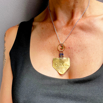 TEXTURED BRASS MOON SHIELD NECKLACE