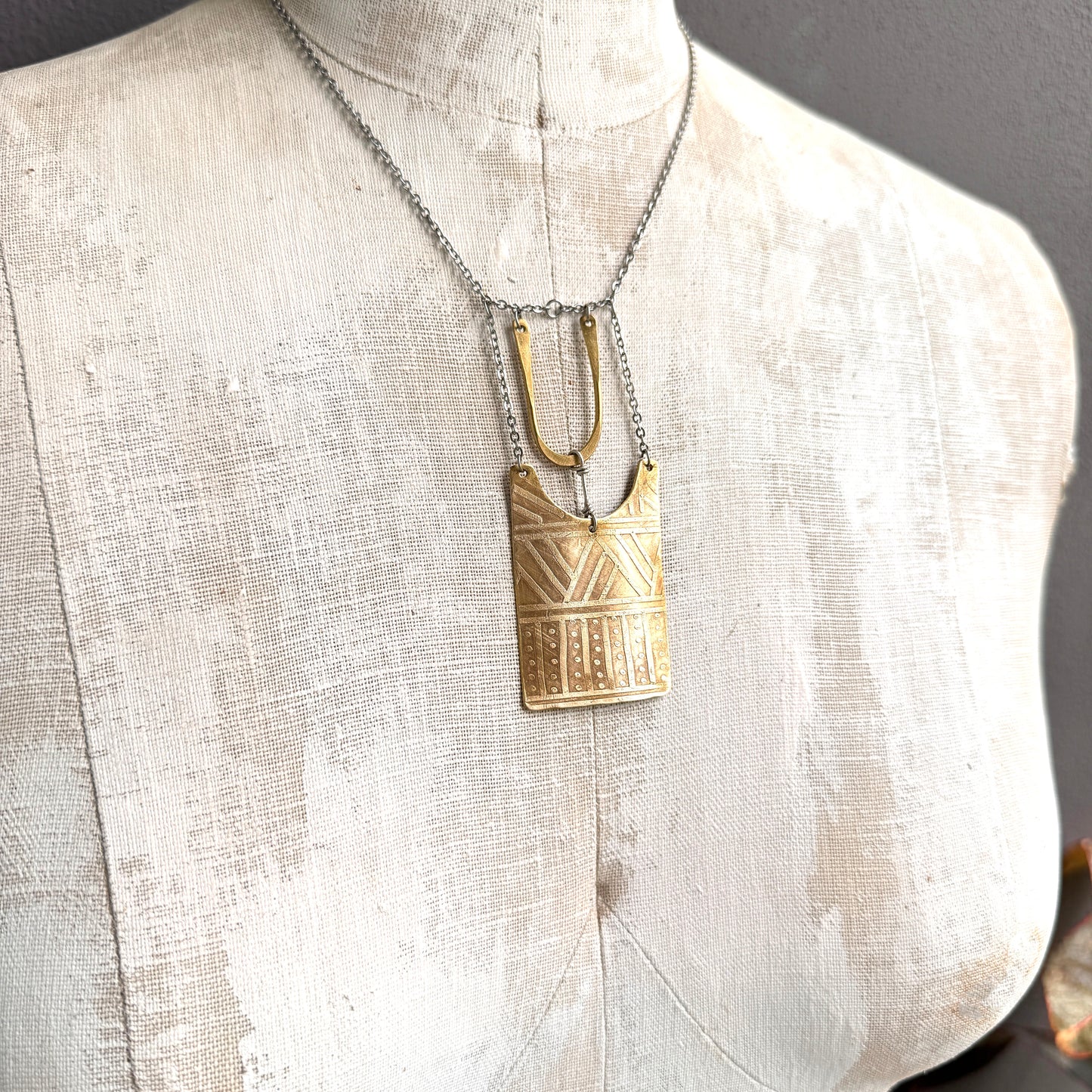 BRASS TRIBAL ETCHED SHIELD NECKLACE