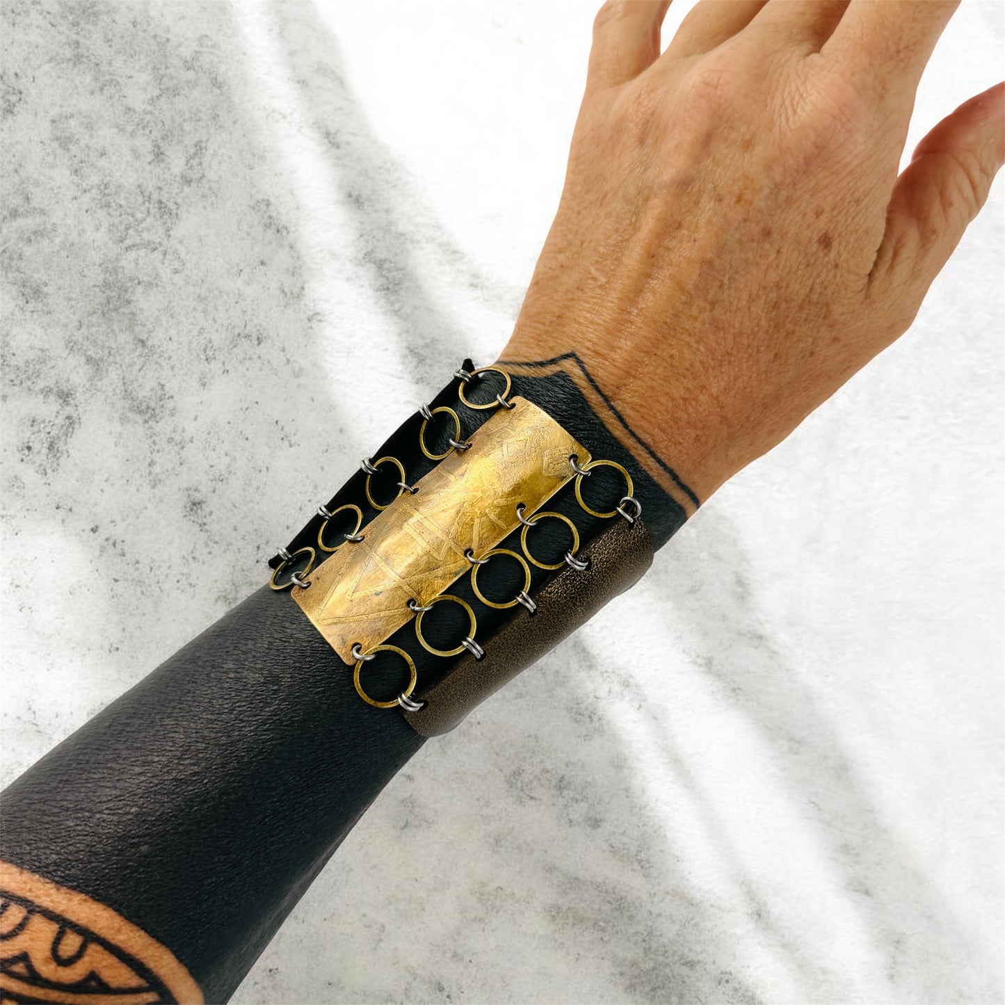 TRIBAL ETCHED BRASS AND METALLIC LEATHER BRACELET